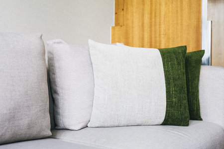 Beautiful comfortable pillow on sofa decoration interior of room