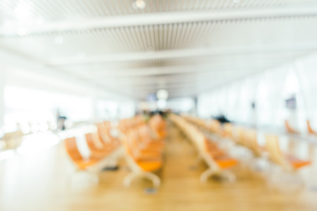 Abstract blur and defocused airport terminal passenger for transportation or business travel interior for backgroundの写真素材