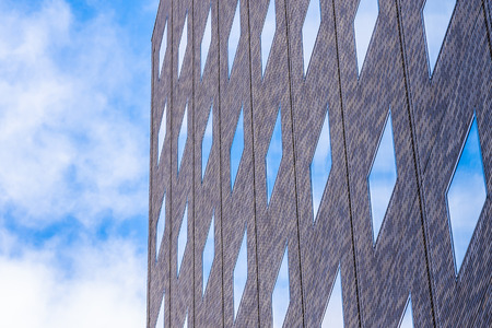 Beautiful architecture skyscraper office business building with glass window shape