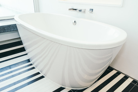 Beautiful luxury white bathtub decoration interior of bathroom for relaxtionの写真素材