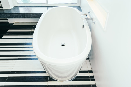 Beautiful luxury white bathtub decoration interior of bathroom for relaxtionの写真素材