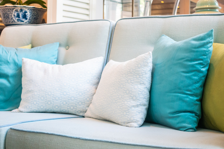 Comfortable pillow on sofa chair decoration interior of roomの写真素材