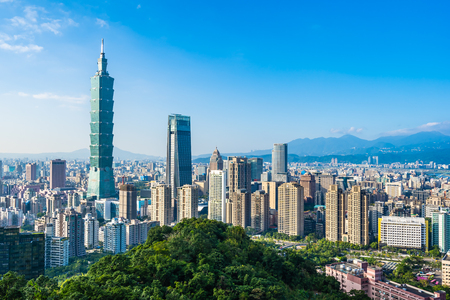 Beautiful landscape and cityscape of taipei 101 building and architecture in the city skyline with bluesky and white cloud at Taiwanの写真素材