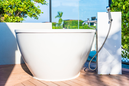 Beautiful luxury white bathtub decoration interior of bathroom for relaxtionの写真素材