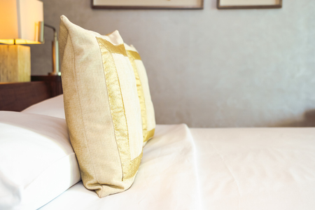Beautiful comfortable pillow on bed decoration in bedroom interior for relax and leisureの写真素材
