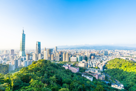 Beautiful landscape and cityscape of taipei 101 building and architecture in the city skyline with bluesky and white cloud at Taiwanの写真素材