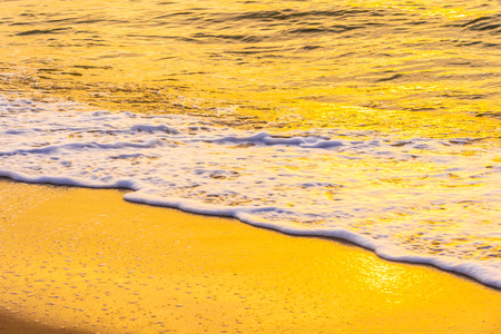 Beautiful outdoor landscape of sea and tropical beach at sunset or sunrise time for leisure travel and vacationの写真素材