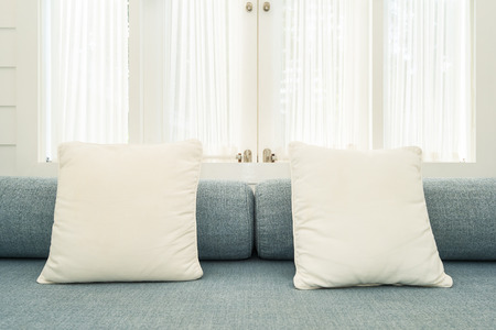Beautiful luxury comfortable pillow on sofa furniture decoration interior of roomの写真素材