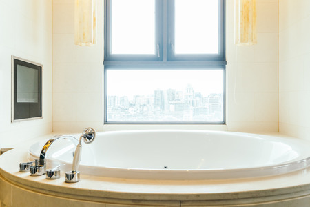 Beautiful luxury white bathtub decoration interior of bathroomの写真素材