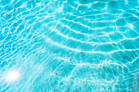 Abstract pool water surface and background with sun light reflection for text copy space