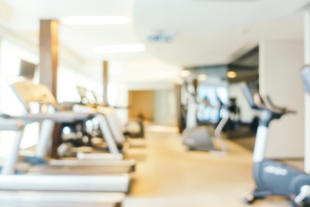 Abstract blur and defocused fitness sport equipment in gym room interior for backgroundの写真素材