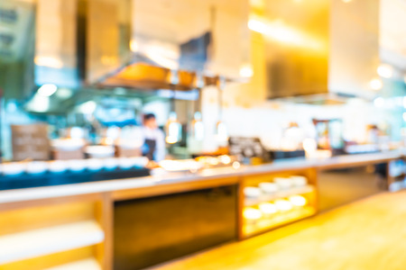 Abstract blur and defocused buffet restaurant and coffee shop cafe interior for backgroundの写真素材