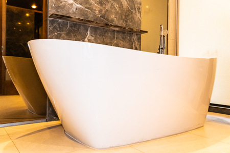Beautiful luxury white bathtub decoration in bathroom interior for relax and spaの写真素材