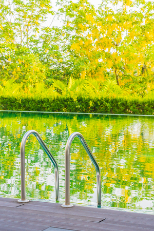 Beautiful luxury outdoor swimming pool in hotel and resort for holiday vacation travel conceptの写真素材