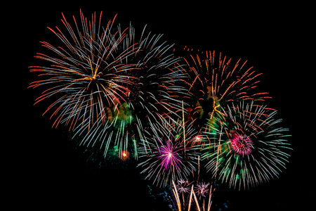 Colorful Firework display background at night for celebration anniversaryの写真素材