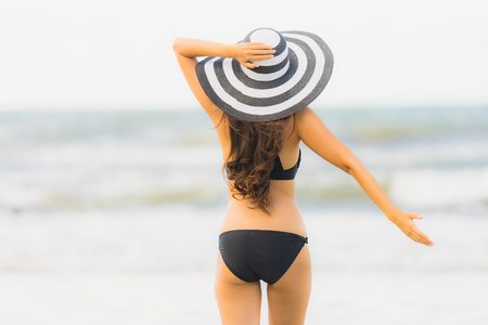 Portrait beautiful young asian woman wear bikini on the beach sea ocean for leisure relax in holiday vacatiom timeの写真素材