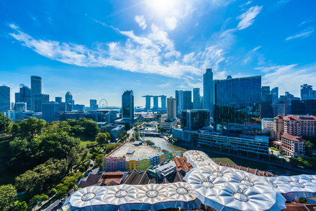 Beautiful architecture building exterior cityscape in Singapore city skyline with white cloud on blue skyのeditorial素材