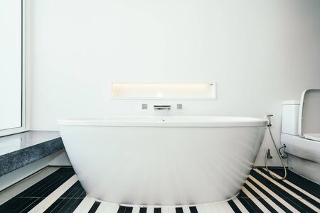 Beautiful luxury white bathtub decoration interior of bathroom for relaxtionの写真素材
