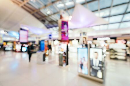 Abstract blur and defocused airport terminal interiorの写真素材
