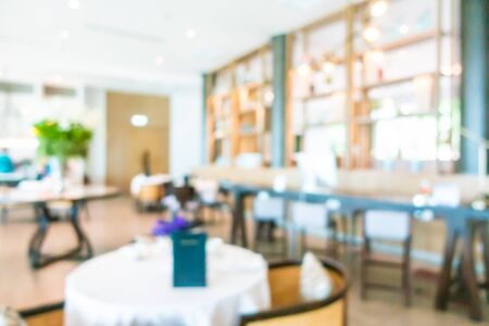 Abstract blur and defocused buffet restaurant and coffee shop cafe interior for backgroundの写真素材