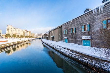 Beautiful landscape and cityscape of Otaru canal river in winter and snow season at Hokkaido Japanのeditorial素材