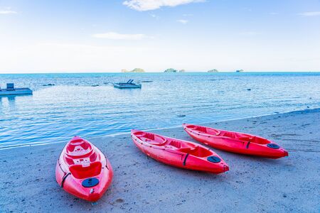 Red kayak on the tropical beach sea and ocean for holiday traval in vacationの写真素材