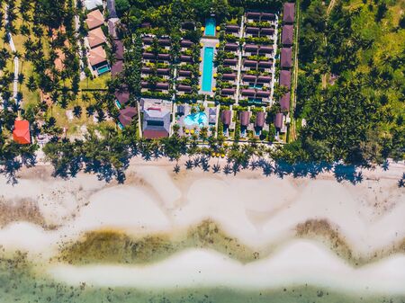 Aerial view of beautiful tropical beach and sea with trees on island for travel and vacationの写真素材