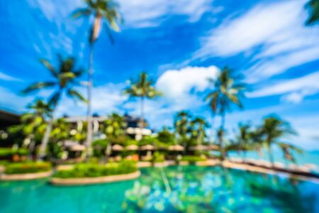 Abstract blur and defocus luxury outdoor swimming pool in hotel resort for holiday vacation travel backgroundの写真素材