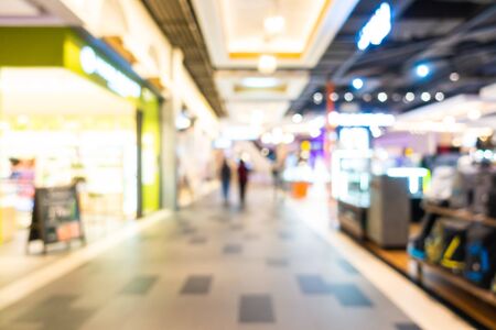 Abstract blur and defocused shopping mall and retail interior of department store for backgroundの写真素材