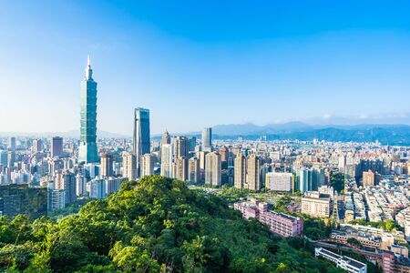 Beautiful landscape and cityscape of taipei 101 building and architecture in the city skyline with bluesky and white cloud at Taiwanの写真素材