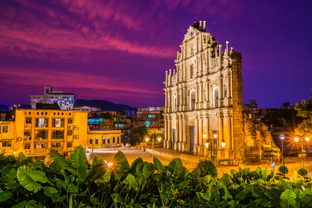 Beautiful old architecture building with ruin of st pual church landmark of macau city at twilight night timeのeditorial素材
