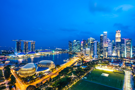 Beautiful architecture building exterior of singapore city skyline at twilight and night timeのeditorial素材