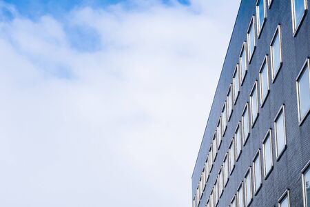 Beautiful architecture skyscraper office business building with glass window shape