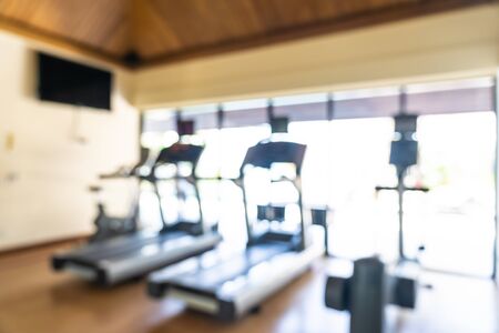 Abstract blur fitness equipment in gym interior roomの写真素材