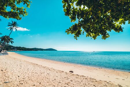 Beautiful tropical beach and sea with chair on blue sky for travel and vacation