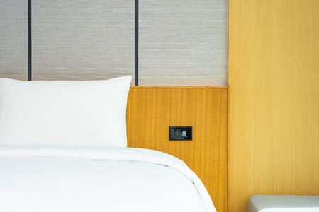 Beautiful luxury comfortable white pillow and blanket on bed decoration in bedroomの写真素材