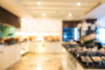 Abstract blur and defocused coffee shop cafe and buffet restaurant interior for backgroundの写真素材