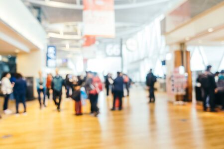 Abstract blur and defocused airport terminal passenger for transportation or business travel interior for backgroundの写真素材