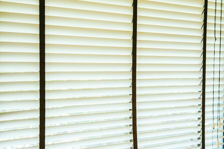 Beautiful blinds window with sunlight decoration interior of room