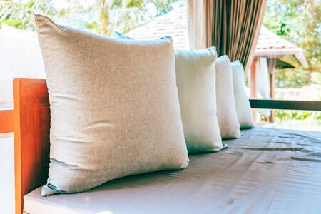 Pillow on sofa chair decoration outdoor patio with garden view for relax and leisureの写真素材