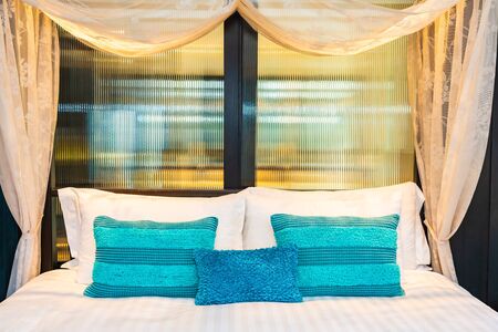 Beautiful comfortable luxury white pillow and blanket on bed decoration in bedroom interiorの写真素材