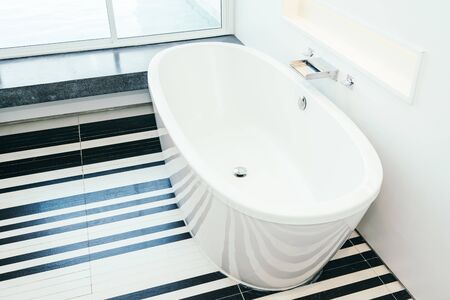 Beautiful luxury white bathtub decoration interior of bathroom for relaxtionの写真素材