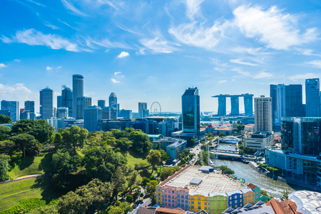 Beautiful architecture building exterior cityscape in Singapore city skyline with white cloud on blue skyのeditorial素材