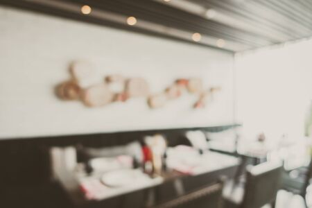 Abstract blur and defocus restaurant and coffee shop cafe interior for backgroundの写真素材