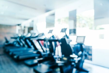 Abstract blur fitness equipment in gym interior
