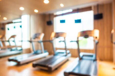 Abstract blur and defocus fitness equipment in gym room interiorの写真素材