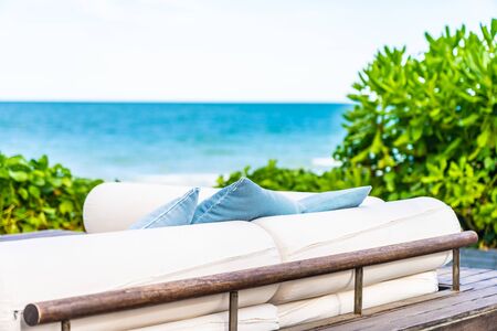 Pillow on sofa decoration nearly beach sea and ocean for leisure relax in holiday vacationの写真素材