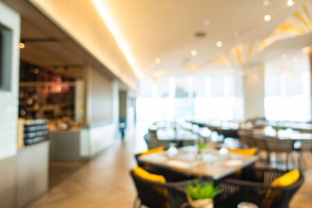 Abstract blur and defocused buffet restaurant and coffee shop cafe interior for backgroundの写真素材