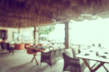 Abstract blur and defocus coffee shop cafe and restaurant interior for backgroundの写真素材