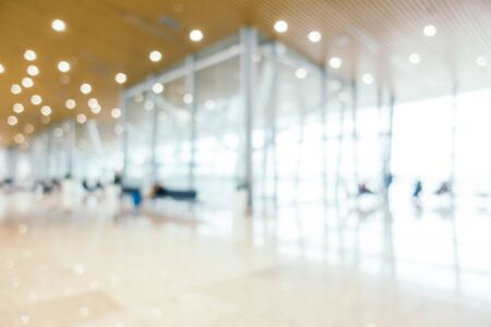 Abstract blur and defocused airport passenger terminal for transportation interior for backgroundの写真素材